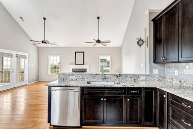 Experience true waterfront living with this custom-built - photo 15