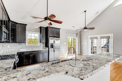 Experience true waterfront living with this custom-built - photo 24