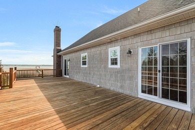 Experience true waterfront living with this custom-built - photo 33