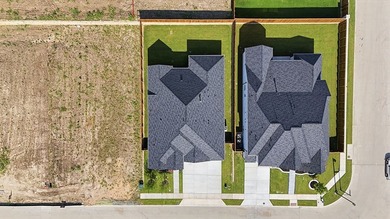 This popular open-concept home features a dramatic vaulted - photo 3