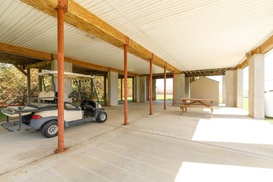 Experience true waterfront living with this custom-built - photo 35