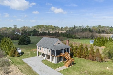 Experience true waterfront living with this custom-built - photo 37