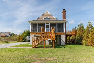Experience true waterfront living with this custom-built - photo 39