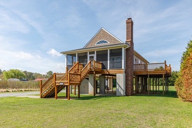 Experience true waterfront living with this custom-built - photo 40