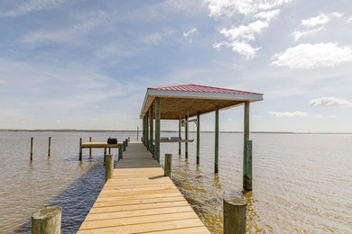 Experience true waterfront living with this custom-built - photo 47