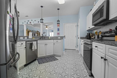 Welcome to this beautifully maintained 3-bedroom, 2-bath condo - photo 2
