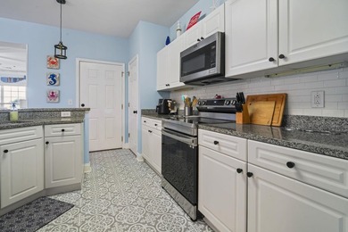 Welcome to this beautifully maintained 3-bedroom, 2-bath condo - photo 3