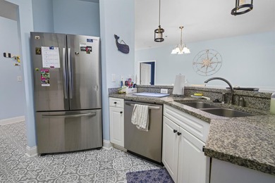 Welcome to this beautifully maintained 3-bedroom, 2-bath condo - photo 5