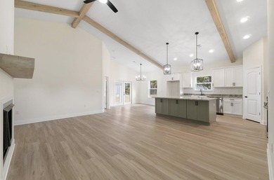 photos of previous build* NO HOA. This semi-custom home offers a - photo 2