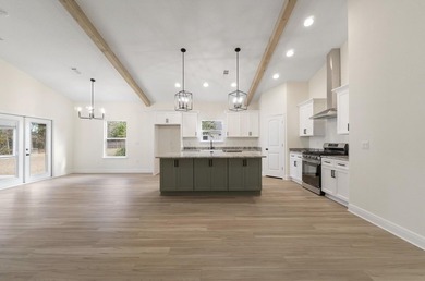 photos of previous build* NO HOA. This semi-custom home offers a - photo 3