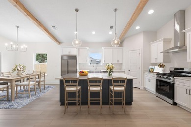 photos of previous build* NO HOA. This semi-custom home offers a - photo 4