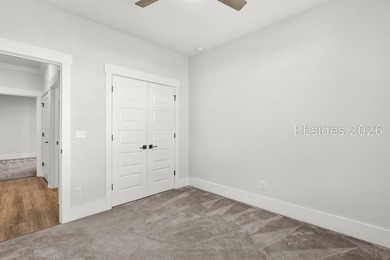 Tucked away on a private, wooded lot, this stunning single-story - photo 12