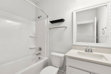 Tucked away on a private, wooded lot, this stunning single-story - photo 14