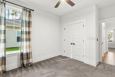Tucked away on a private, wooded lot, this stunning single-story - photo 16