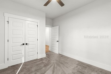 Tucked away on a private, wooded lot, this stunning single-story - photo 17