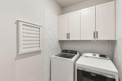 Tucked away on a private, wooded lot, this stunning single-story - photo 18