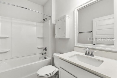 Tucked away on a private, wooded lot, this stunning single-story - photo 19