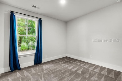 Tucked away on a private, wooded lot, this stunning single-story - photo 20