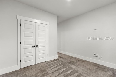 Tucked away on a private, wooded lot, this stunning single-story - photo 22