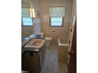 This lovely home sits in an ideal location on beautiful Drake