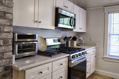 Completely renovated pond view Cape offering the perfect blend - photo 7