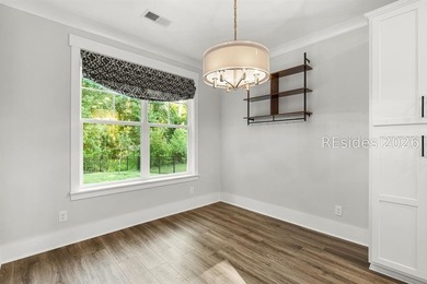 Tucked away on a private, wooded lot, this stunning single-story - photo 30