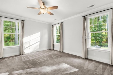 Tucked away on a private, wooded lot, this stunning single-story - photo 32