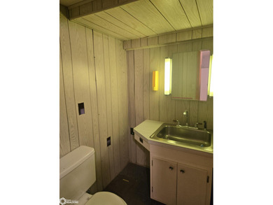 This lovely home sits in an ideal location on beautiful Drake