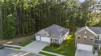 Tucked away on a private, wooded lot, this stunning single-story - photo 41