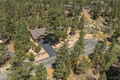 This breathtaking custom Craftsman home is tucked away on a - photo 3
