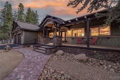 This breathtaking custom Craftsman home is tucked away on a - photo 4