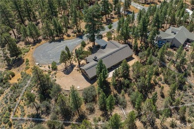 This breathtaking custom Craftsman home is tucked away on a - photo 6