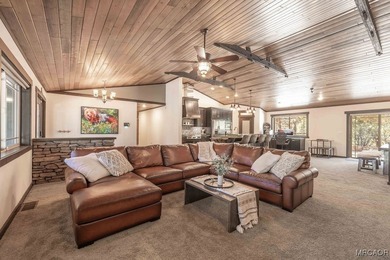 This breathtaking custom Craftsman home is tucked away on a - photo 9