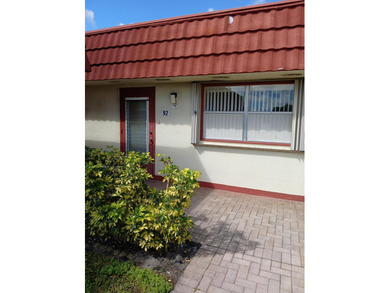 VILLA Lake View End Unit, all diagonal tile floors throughout - photo 1