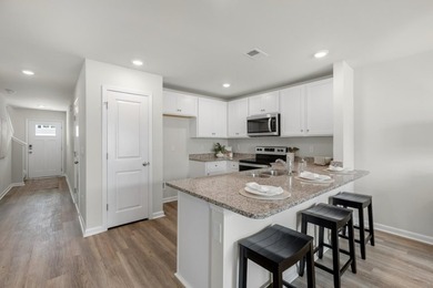 Final Opportunities at The Cove at Glenns Bay! This townhome - photo 2