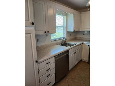 VILLA Lake View End Unit, all diagonal tile floors throughout - photo 5