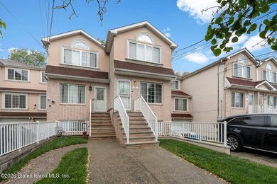 Welcome home to this exceptional two-family residence nestled in - photo 2