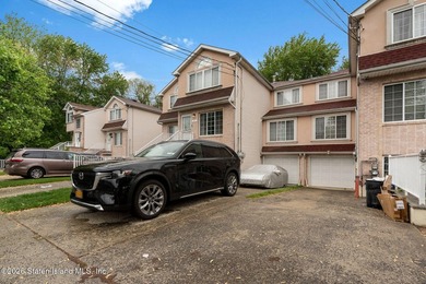 Welcome home to this exceptional two-family residence nestled in - photo 3