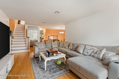 Welcome home to this exceptional two-family residence nestled in - photo 4