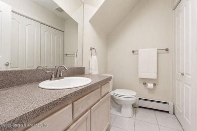 Welcome home to this exceptional two-family residence nestled in - photo 8