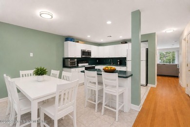 Welcome home to this exceptional two-family residence nestled in - photo 10