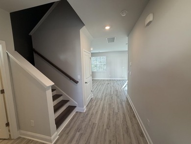 This home in the gated neighborhood of Waterbridge is brand new - photo 5