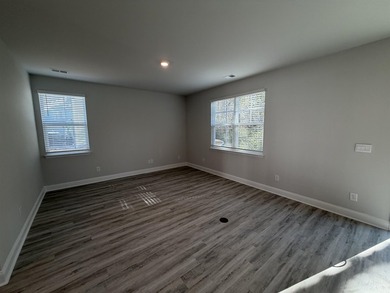 This home in the gated neighborhood of Waterbridge is brand new - photo 7