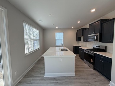 This home in the gated neighborhood of Waterbridge is brand new - photo 9