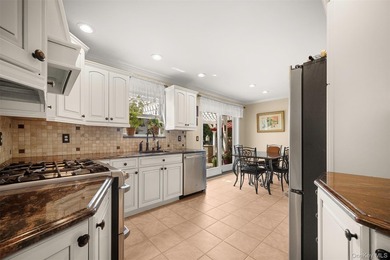 Exquisite custom-built Colonial elegantly positioned midblock on - photo 9
