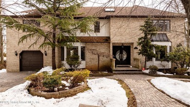 This Arden Heights center hall colonial will sell via auction on - photo 1