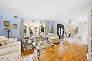 This Arden Heights center hall colonial will sell via auction on - photo 4