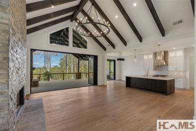 Nestled within the gates of Wildcat Cliffs Country Club but part