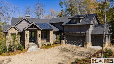 Nestled within the gates of Wildcat Cliffs Country Club but part