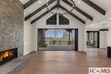 Nestled within the gates of Wildcat Cliffs Country Club but part